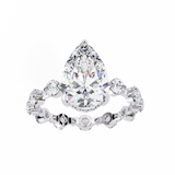 14k IGI certified pear ring with E-F color VVS-VS clarity diamonds 145
