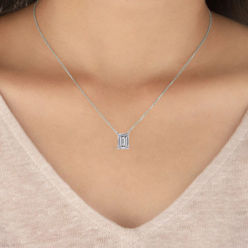 14K White Gold IGI Certified Emerald Cut Diamond Solitaire Pendant – D-E Color, VVS–VS Clarity, Rabbit Ear Bail