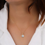 Classic 14K white gold pendant featuring a cushion-cut diamond solitaire, IGI certified with D–E color and VVS–VS clarity, finished with an elegant bail.