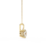 Classic 14K white gold pendant featuring a cushion-cut diamond solitaire, IGI certified with D–E color and VVS–VS clarity, finished with an elegant bail.